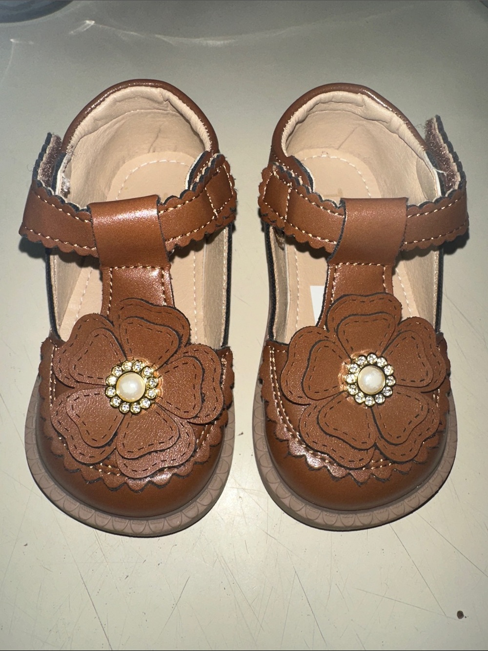 Amazon Brown Girls' T‑Strap Floral Dress Shoes with Pearl Accent